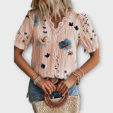 Bruna - Blusa elegante com um decote pontiagudo